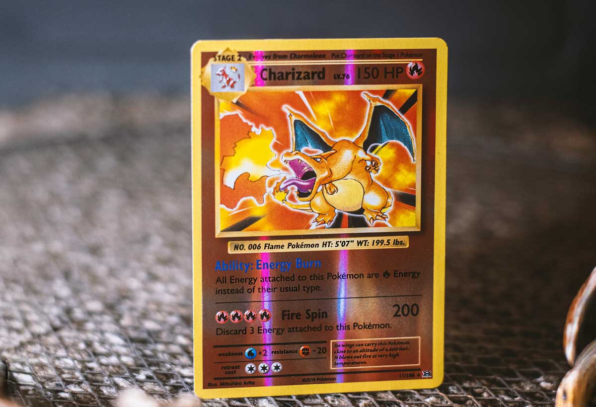 A Pokémon card featuring a detailed illustration of  charizard
