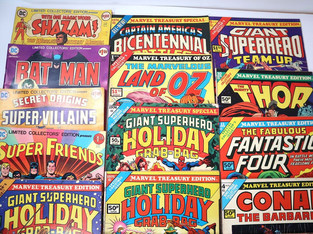 Collection of vintage Marvel and DC comic books featuring Batman, Shazam, Thor, Fantastic Four and Captain America editions displayed together.