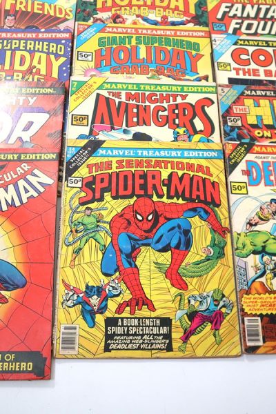 Vintage Marvel comic books featuring Spider-Man, The Avengers, The Hulk, The Defenders and Fantastic Four displayed as part of a collection.